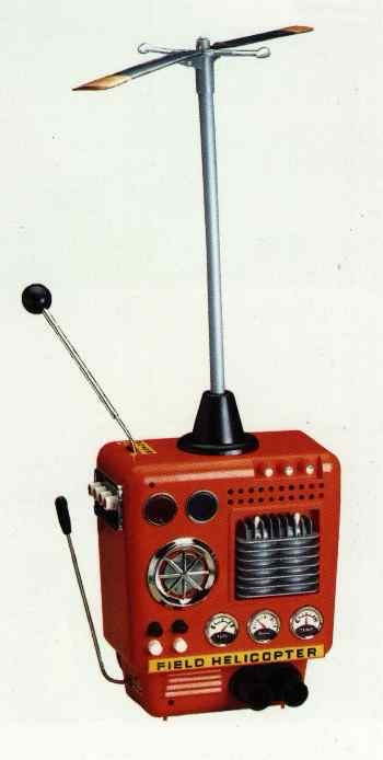 A vintage red radio with a tall metal antenna topped by a small propeller, and a smaller telescoping antenna on the side…