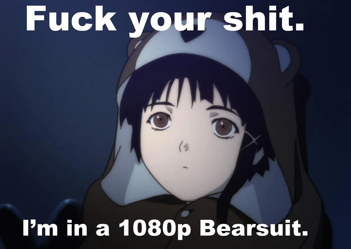 An anime girl with short black hair and brown eyes wears a brown and white bear-themed hooded outfit against a dark blue…