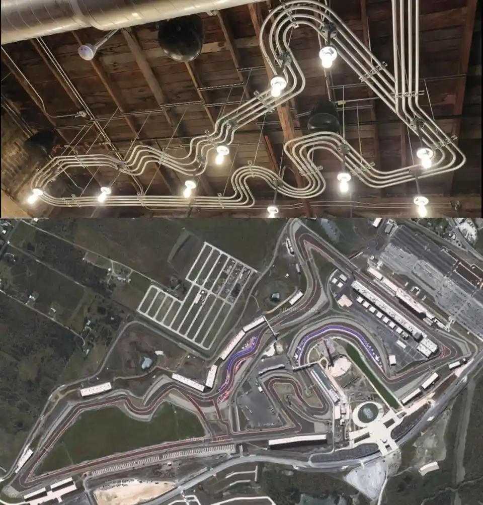 The image is split: the top half shows a ceiling with white pipes and lights arranged in a winding, serpentine pattern…