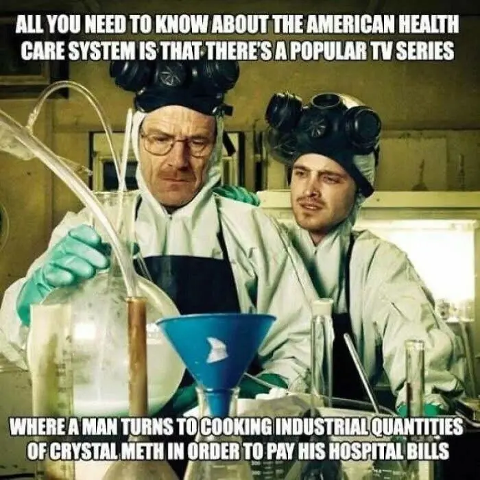 Two men in lab coats and gas masks are shown in a chemistry lab, surrounded by glassware and tubing. The man on the left…