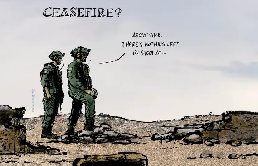 Two soldiers stand in a barren, war-torn landscape with rubble and destroyed vehicles. The soldier on the right, sitting on…