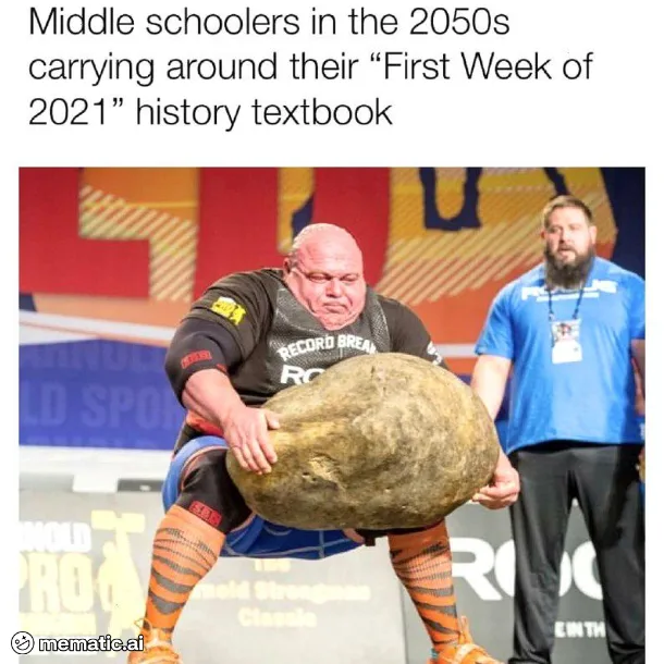 A muscular man in a black 'Record Breaker' shirt and orange striped socks is struggling to lift an enormous, heavy-looking…
