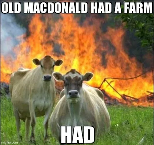 Two cows stand in a grassy field with a large, raging fire behind them. The text at the top reads 'OLD MACDONALD HAD A FARM'…
