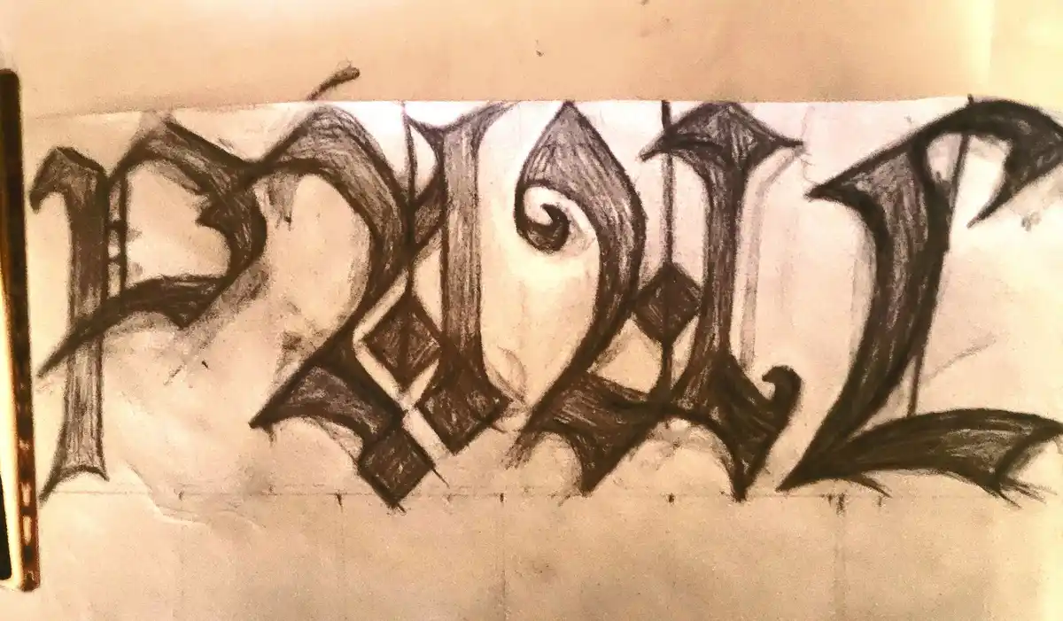 A hand-drawn, ornate, black-and-white lettering of the name 'paul' in a gothic or calligraphic style, sketched on paper with…