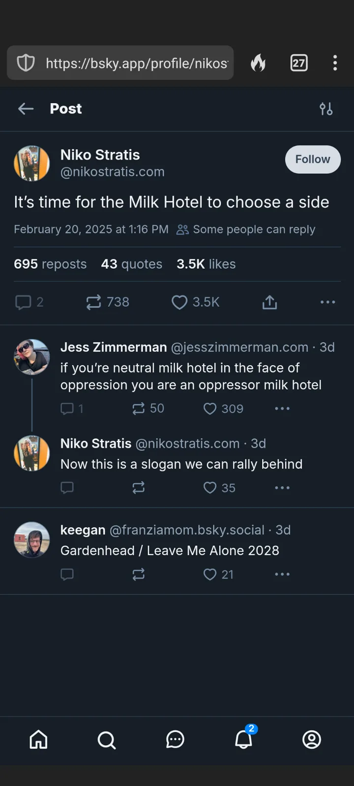 A screenshot of a Bluesky social media thread shows user Niko Stratis posting 'It's time for the Milk Hotel to choose a…