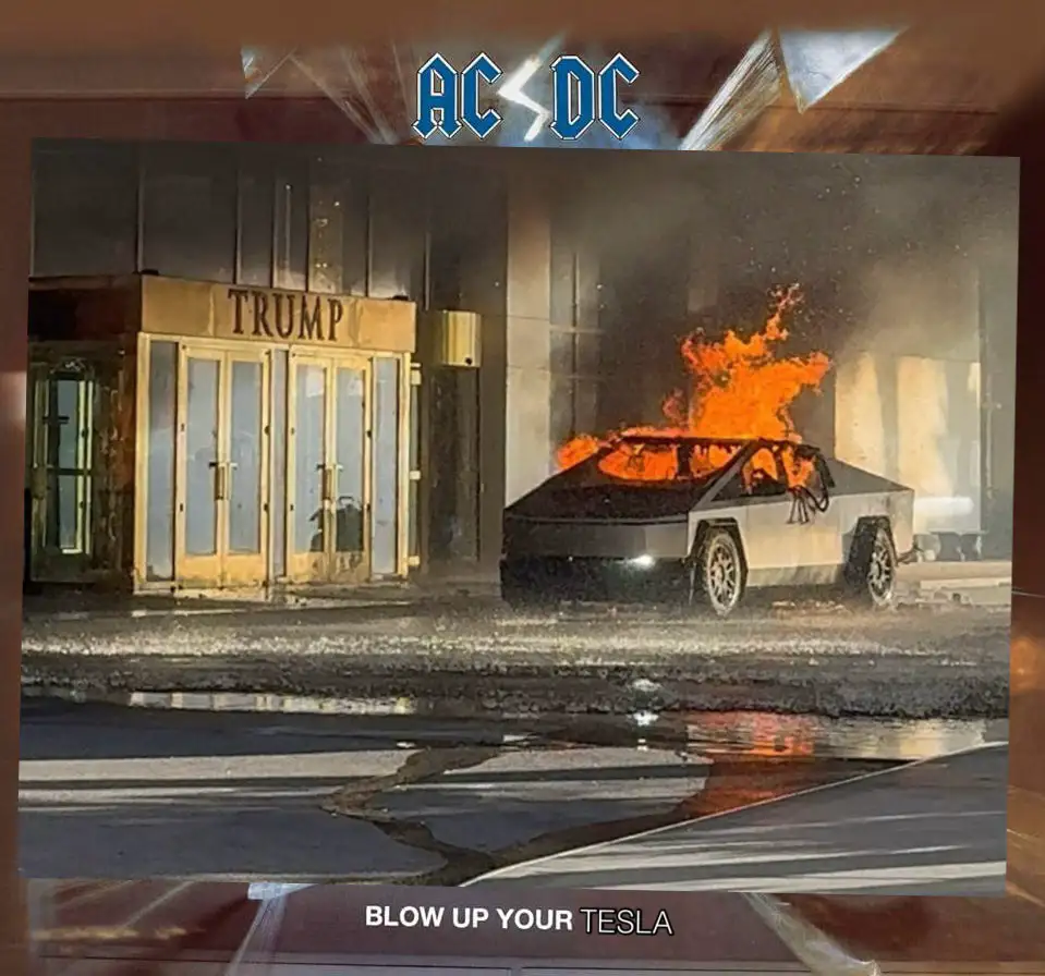 A Tesla Cybertruck is on fire in front of a building with a 'TRUMP' sign above its entrance. The image has 'AC/DC' logo at…