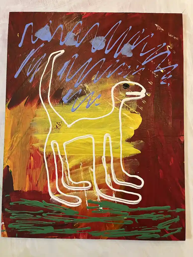 A painting depicts a stylized yellow dinosaur-like creature outlined in white against a red and orange background with green…