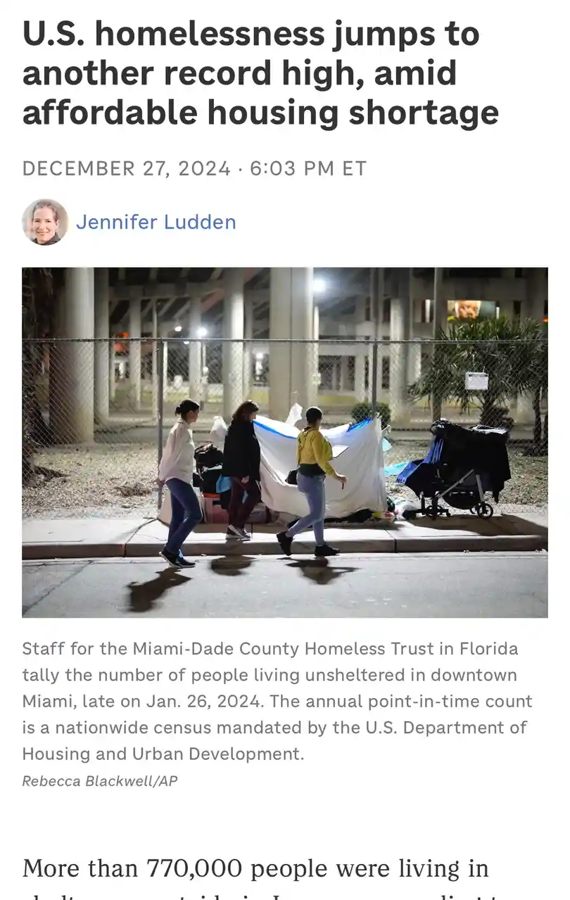 A news article screenshot shows three women walking past a makeshift homeless encampment under a bridge at night, with a…