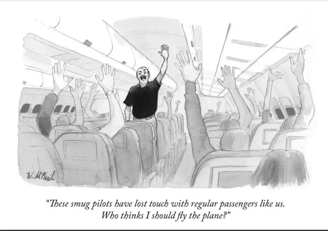 A black-and-white cartoon depicts a man standing in an airplane aisle with his arms raised, surrounded by passengers also…