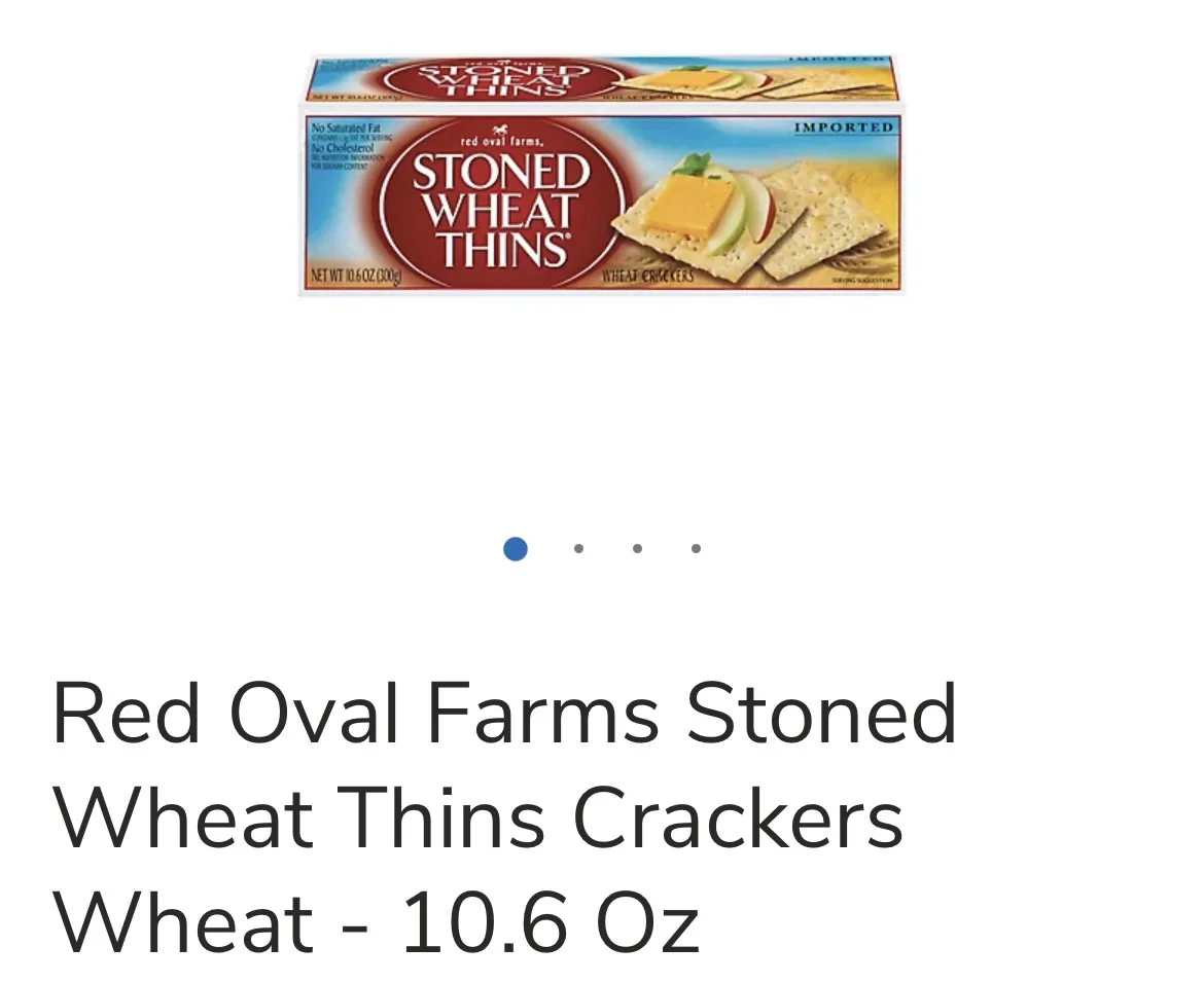 An image of a box of Red Oval Farms Stoned Wheat Thins crackers, featuring a product shot with crackers, cheese, and apple…