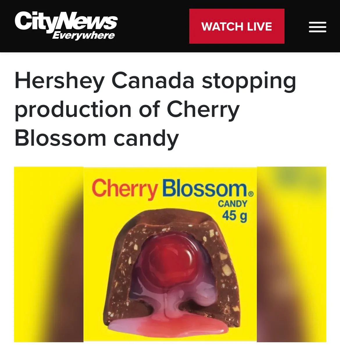 A screenshot of a CityNews article headline about Hershey Canada halting production of Cherry Blossom candy, with an image…
