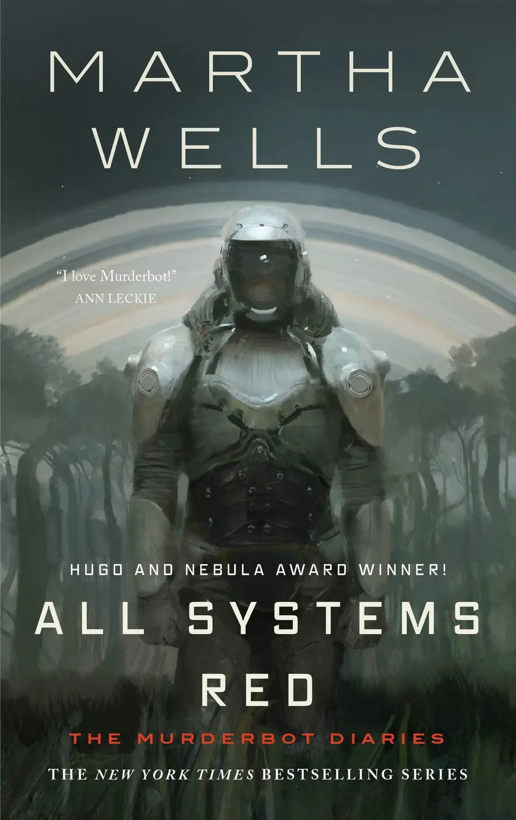The image is the book cover for 'All Systems Red' by Martha Wells, featuring a humanoid robot in a helmet and armored suit…