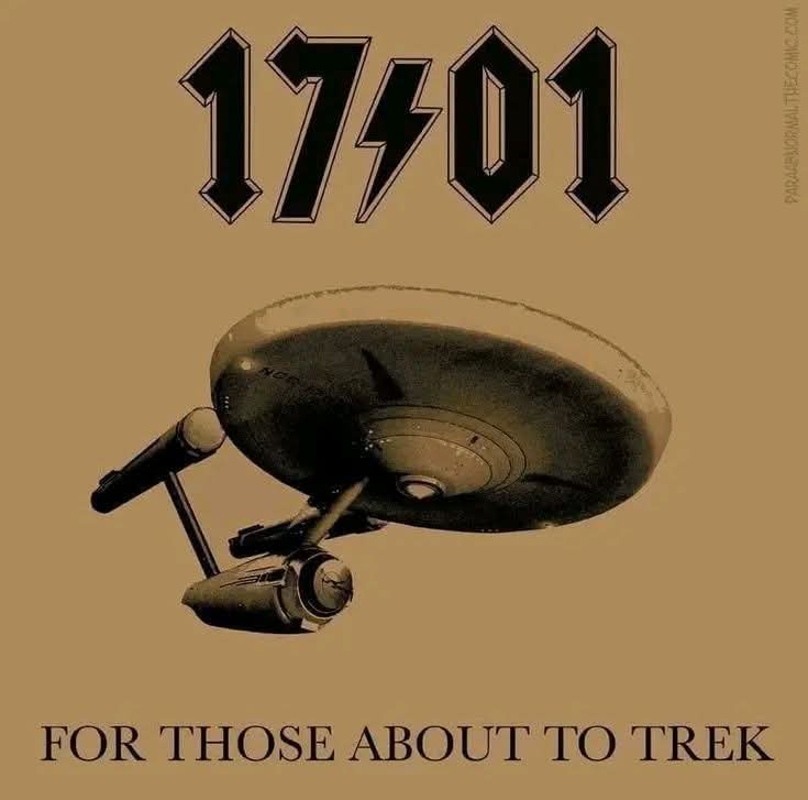 A sepia-toned image of the Starship Enterprise from Star Trek, viewed from below, with the text '17⚡01' in a bold, stylized…