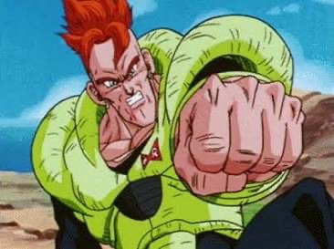 A muscular anime character with red spiky hair and a green outfit is shown in a close-up, gritting his teeth and pointing…