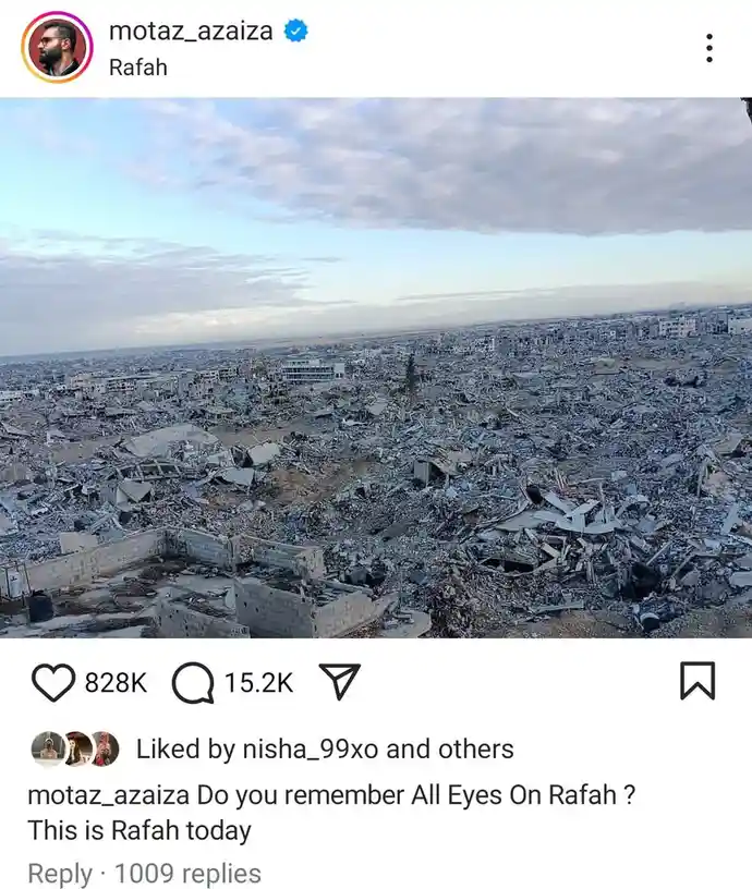 An Instagram post by user motaz_azaiza shows a wide aerial view of the city of Rafah, which is almost entirely destroyed…