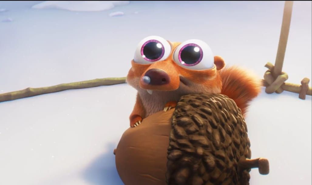 A cartoon squirrel with oversized, sparkly purple-rimmed eyes clutches a large acorn in a snowy landscape. The squirrel has…