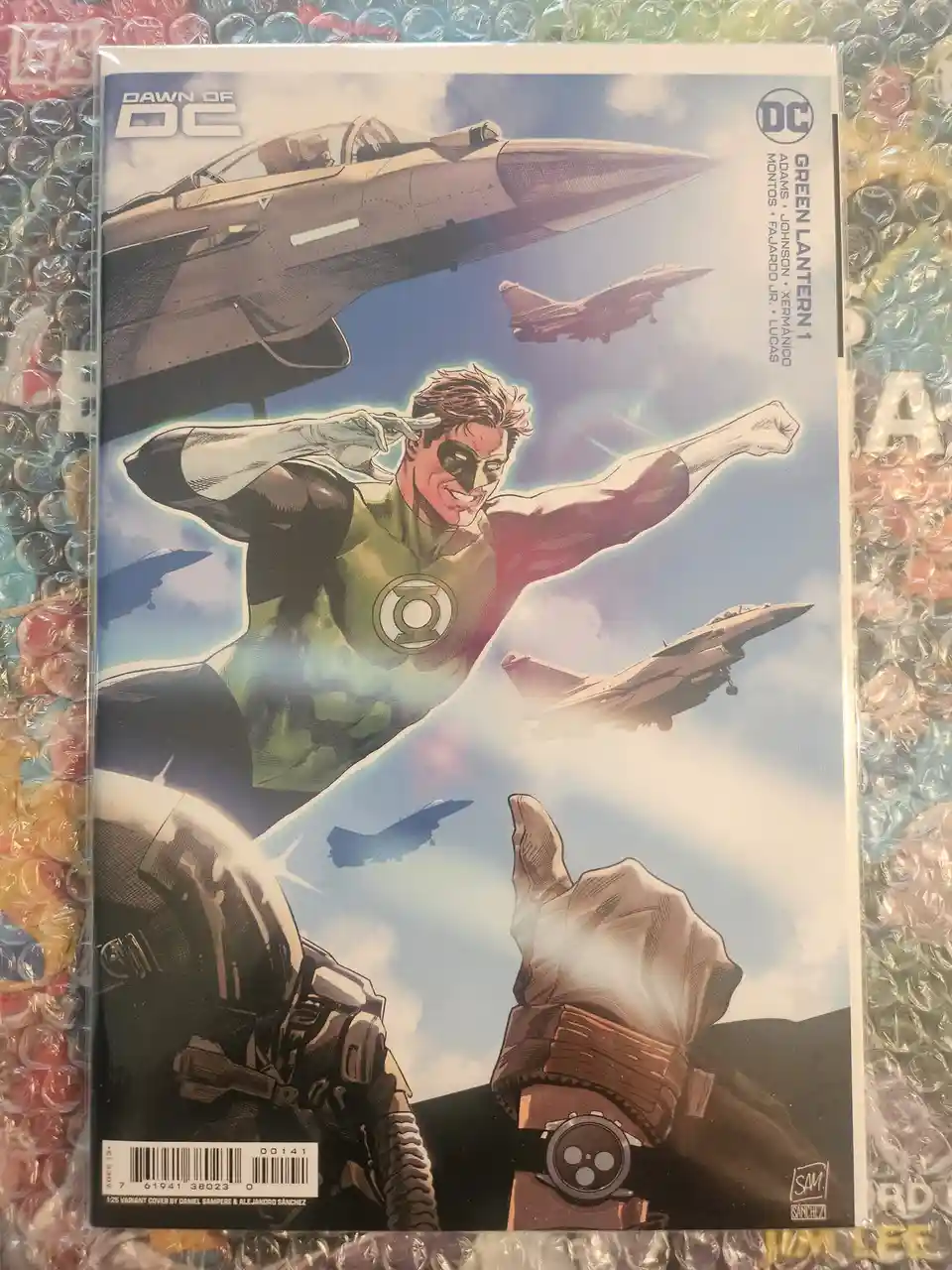 A comic book cover for 'Green Lantern #1' from the 'Dawn of DC' series, featuring the superhero Green Lantern flying…