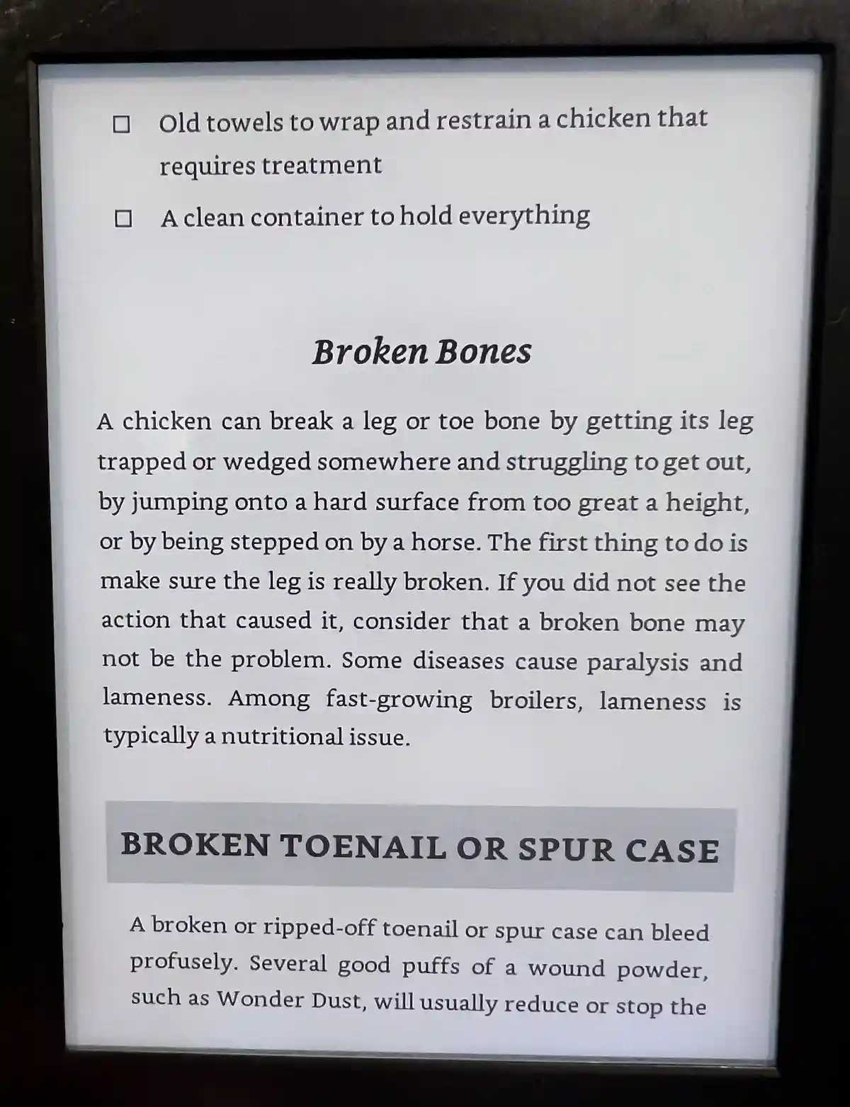 A framed informational sign with black text on a white background, detailing how to treat broken bones and broken toenails…