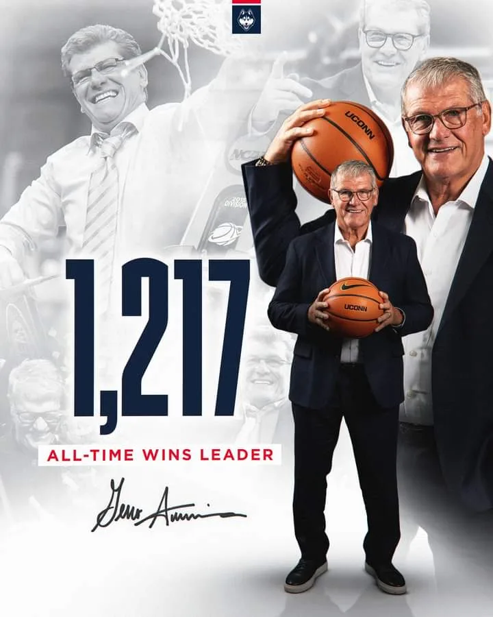 A promotional image features basketball coach Geno Auriemma holding two basketballs, with the large number '1,217' and the…