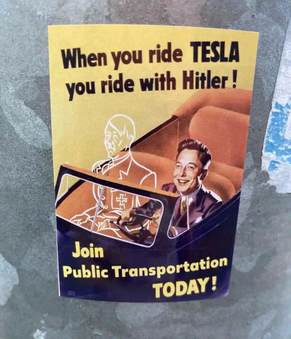 A yellow and blue poster mimicking a vintage public service announcement, featuring a smiling Elon Musk in the passenger…
