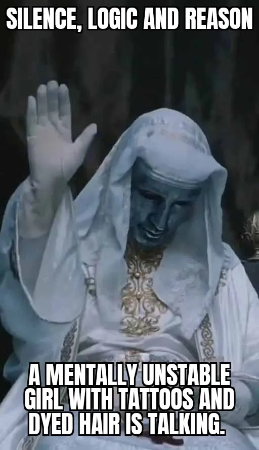 A statue of a serene, blue-skinned figure in white robes with gold embroidery raises one hand in a gesture of stopping or…