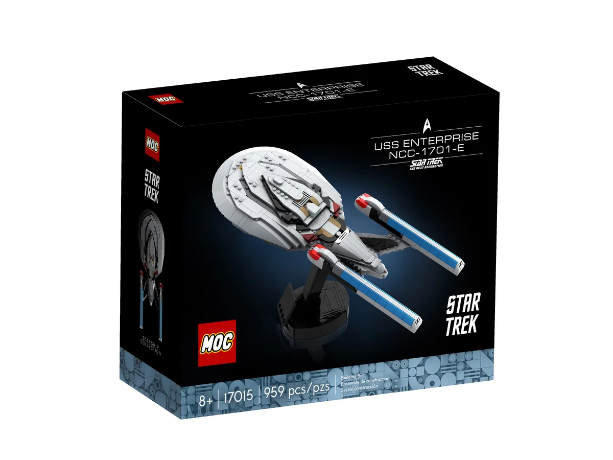 A black LEGO MOC box for a Star Trek USS Enterprise NCC-1701-E model, featuring a white, grey, and blue spaceship made of…