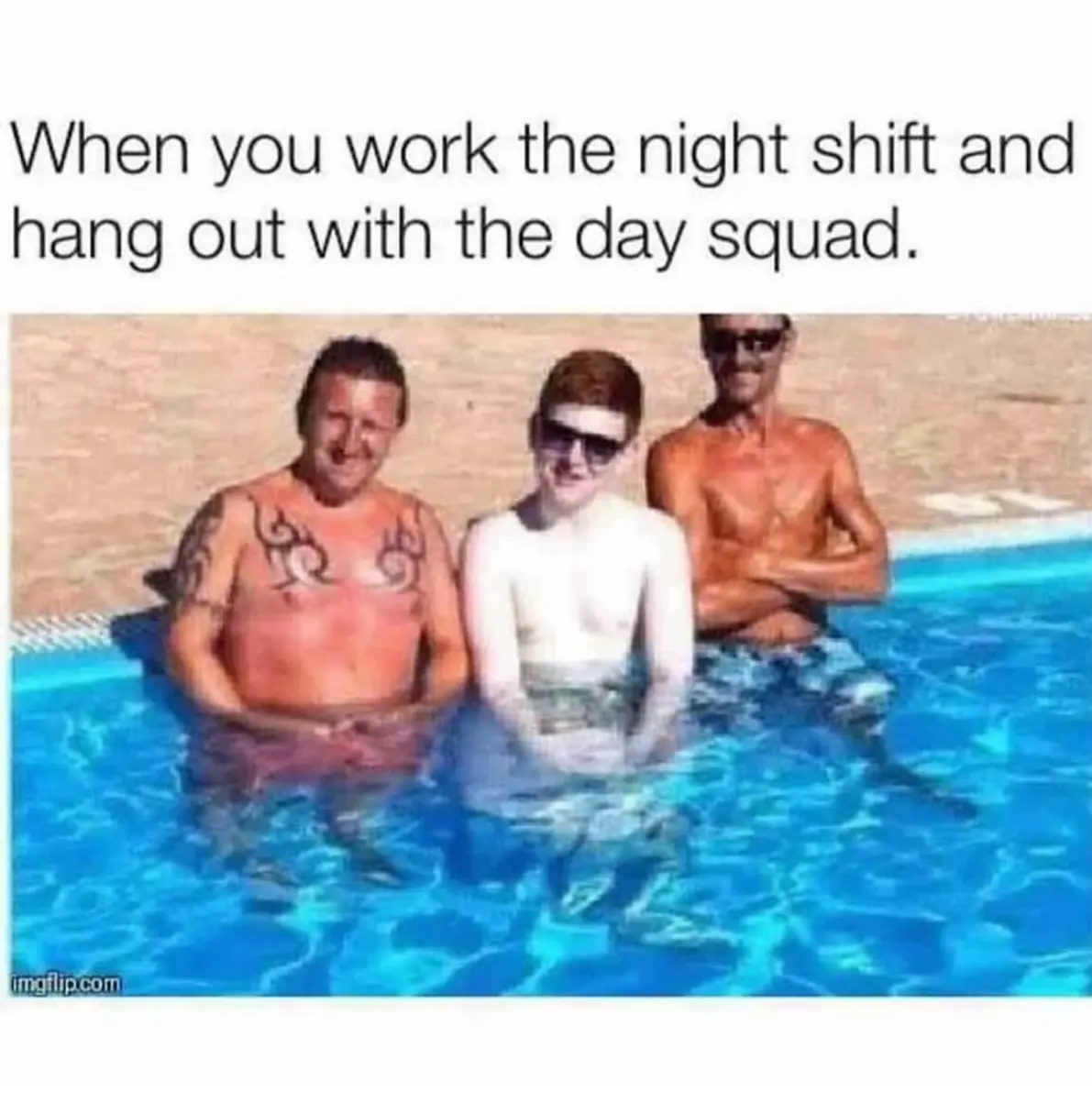 Three men are in a swimming pool, with the person in the middle appearing extremely pale compared to the two men on either…