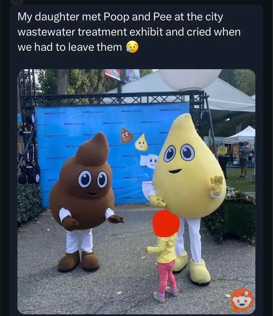 A young child stands between two large, friendly-looking mascot characters: one shaped like a brown poop emoji and the other…