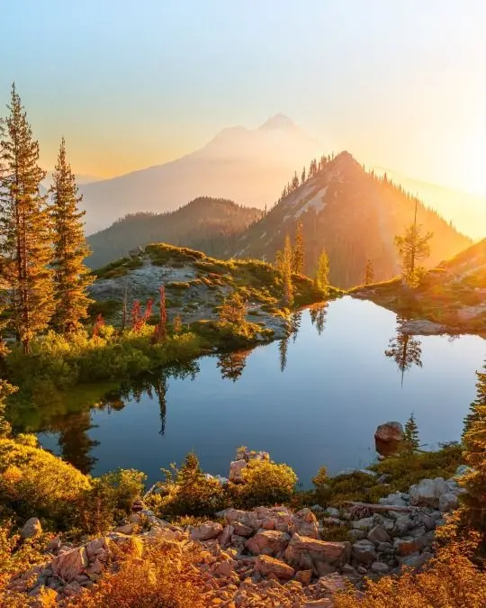 Serenity in the Mountains: Captivating Sunset Reflections and Nature's Splendor