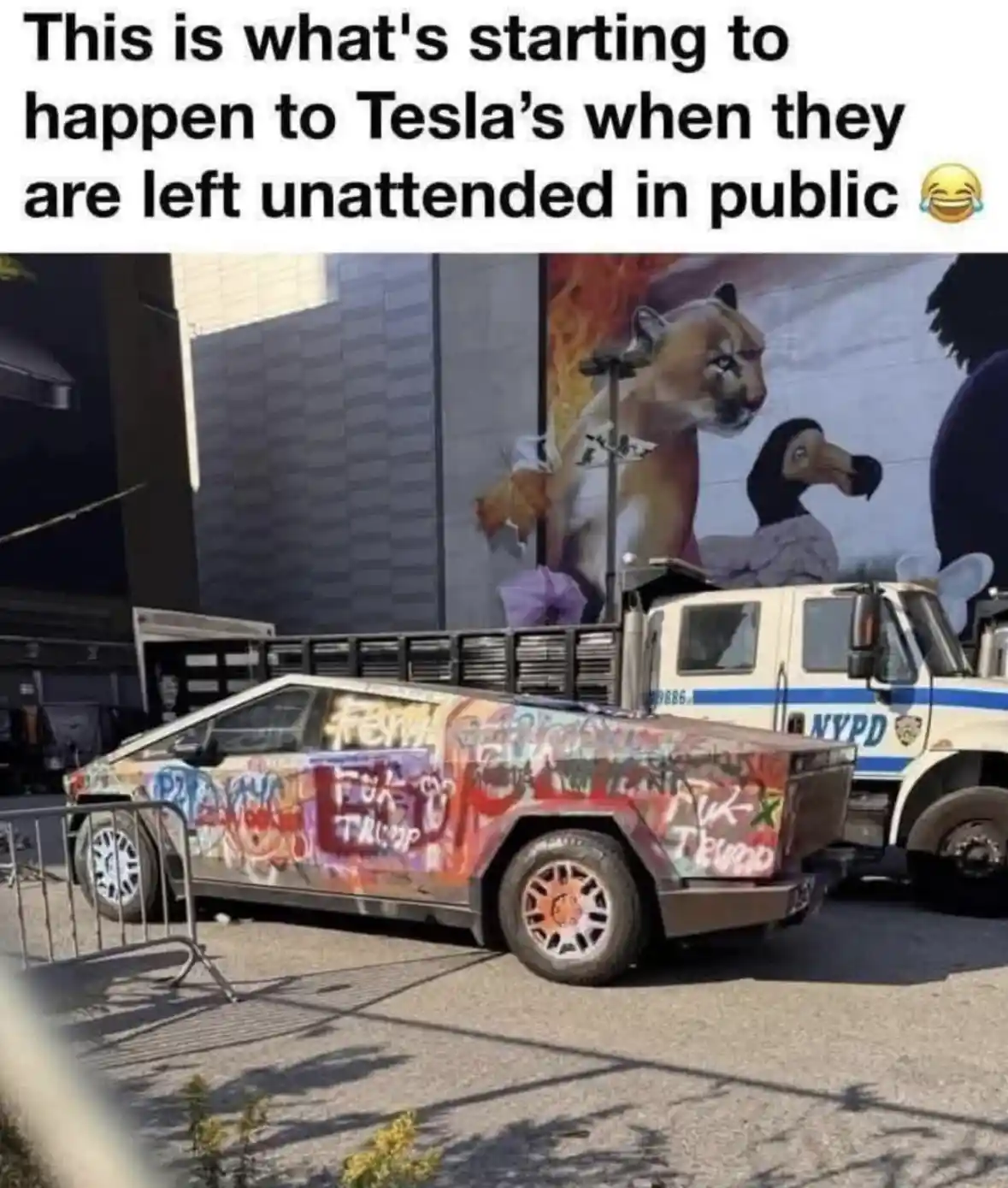 A heavily vandalized Tesla Cybertruck, covered in colorful graffiti including 'F*** TRUMP', is parked on a city street next…