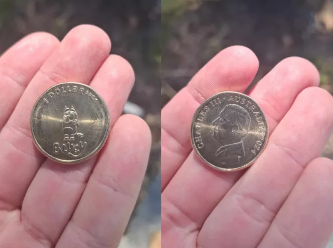 Two side-by-side photos show a hand holding an Australian one-dollar coin. The left image displays the coin's reverse with a…