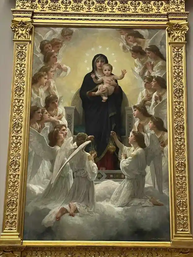 A classical religious painting depicts the Virgin Mary holding the infant Jesus, surrounded by numerous angels in white…