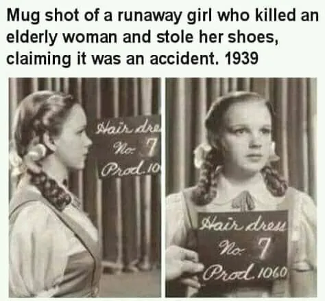 A vintage black-and-white photo shows a young woman in a studio setting, presented as a mugshot. She has braided hair with…