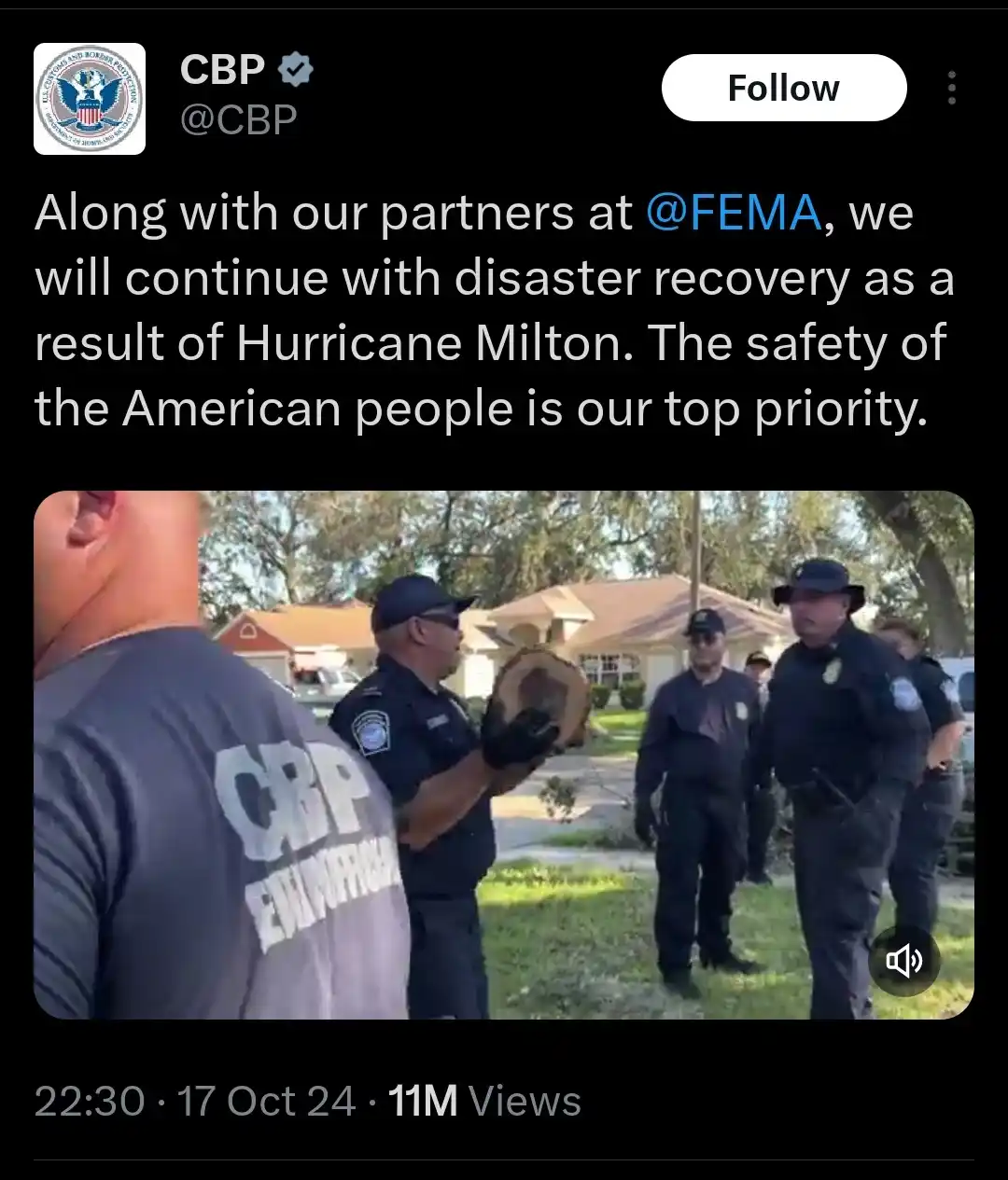 A screenshot of a CBP Twitter post showing officers in uniform standing in a residential yard, one holding a large tree…