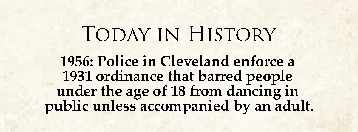 The image displays a beige, parchment-textured background with black serif text. The top line reads 'TODAY IN HISTORY'…
