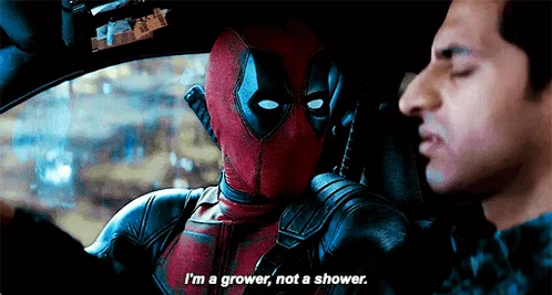 The image shows two side-by-side panels of a car interior. In each panel, there are two men: one is Deadpool in his red and…