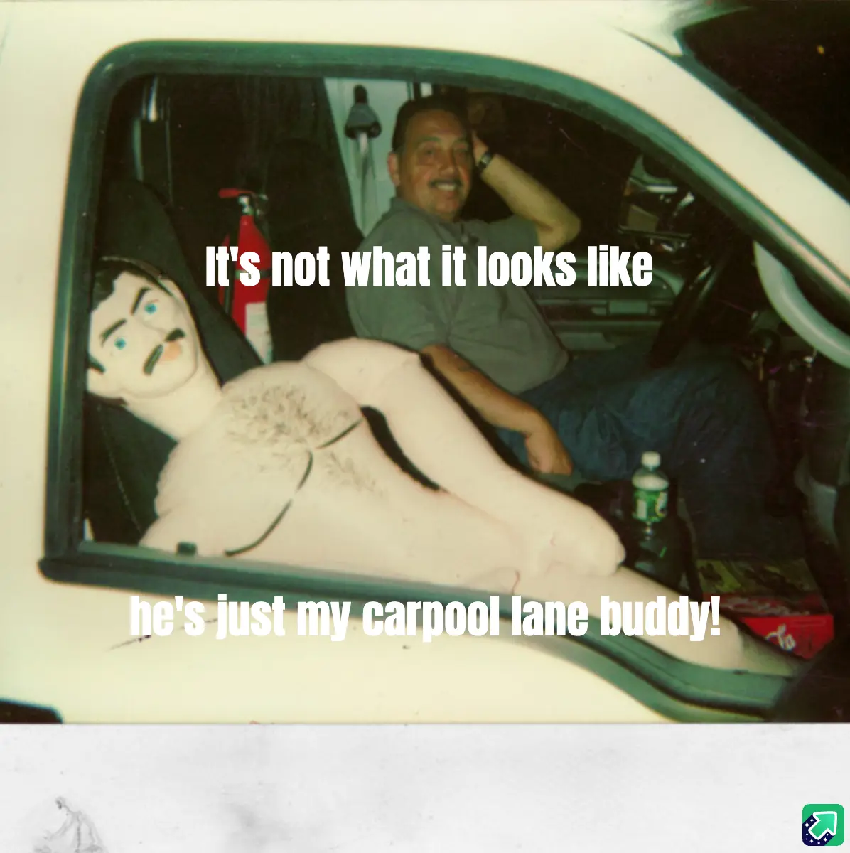 A man sits in the driver's seat of a car, smiling, while a large, nude, mannequin-like figure with a painted face and…