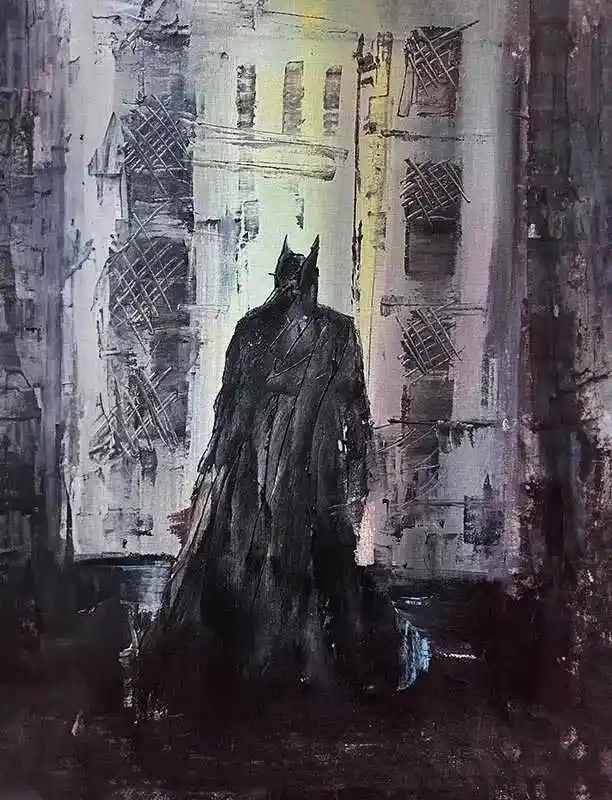 A dark, painterly image shows the silhouette of Batman standing in a narrow, grimy alleyway between tall buildings, his cape…