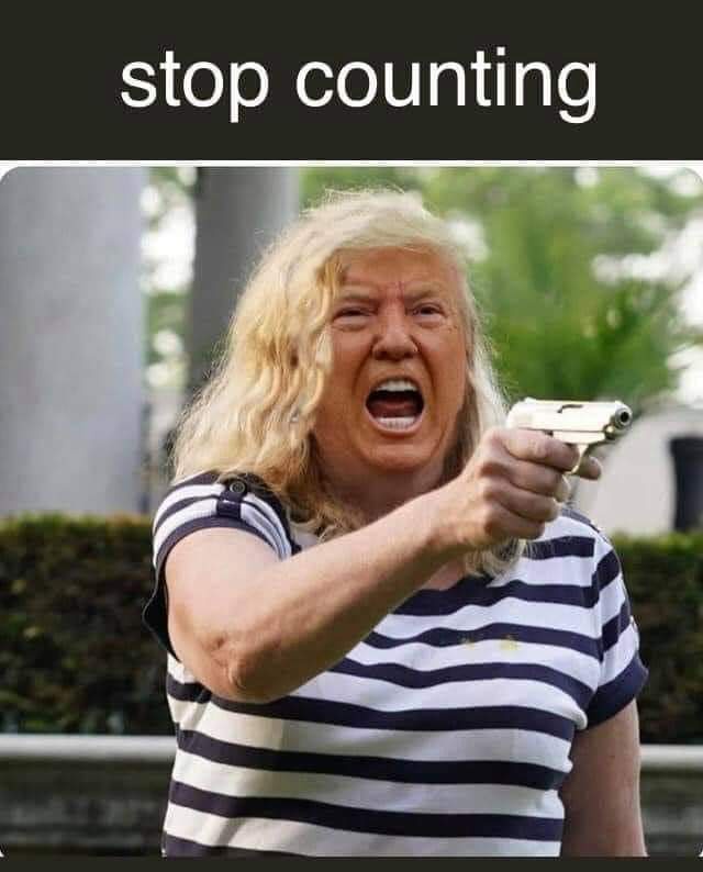 A person with long blonde hair and a striped shirt is pointing a handgun forward with an angry, shouting expression. The…