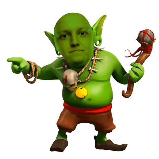 A green-skinned, bald, elf-like creature with pointed ears, wearing brown shorts and a red belt, points accusingly at the…