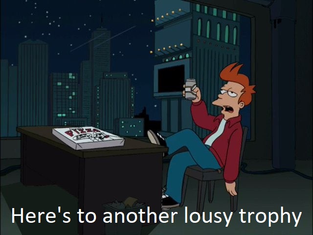 A cartoon man with spiky red hair sits at a desk in a city at night, holding a drink and looking at a pizza box on the desk…