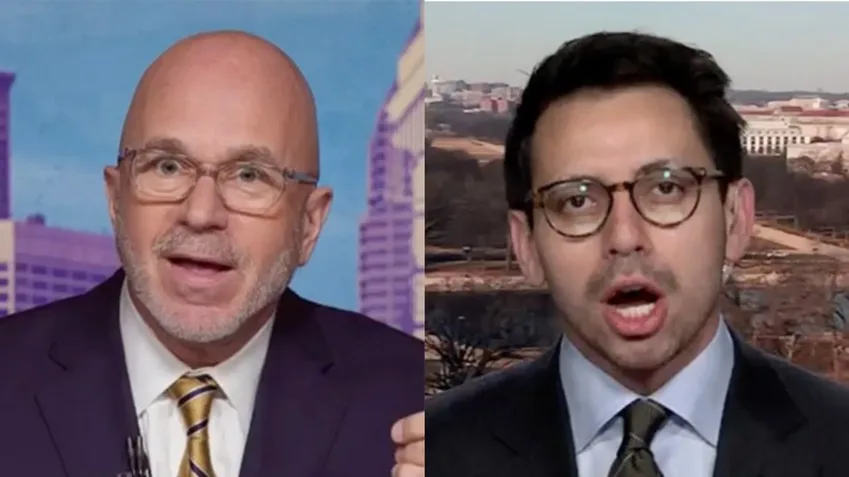 The image shows two men side-by-side, both wearing glasses and suits, with their mouths open as if speaking emphatically…