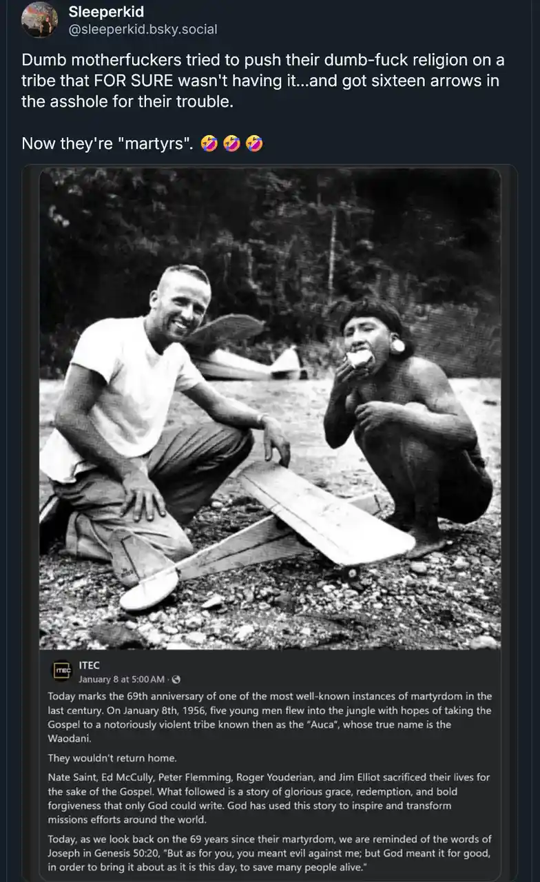 A black-and-white photo shows two men crouching outdoors next to a small wooden airplane. One man, in a white t-shirt…