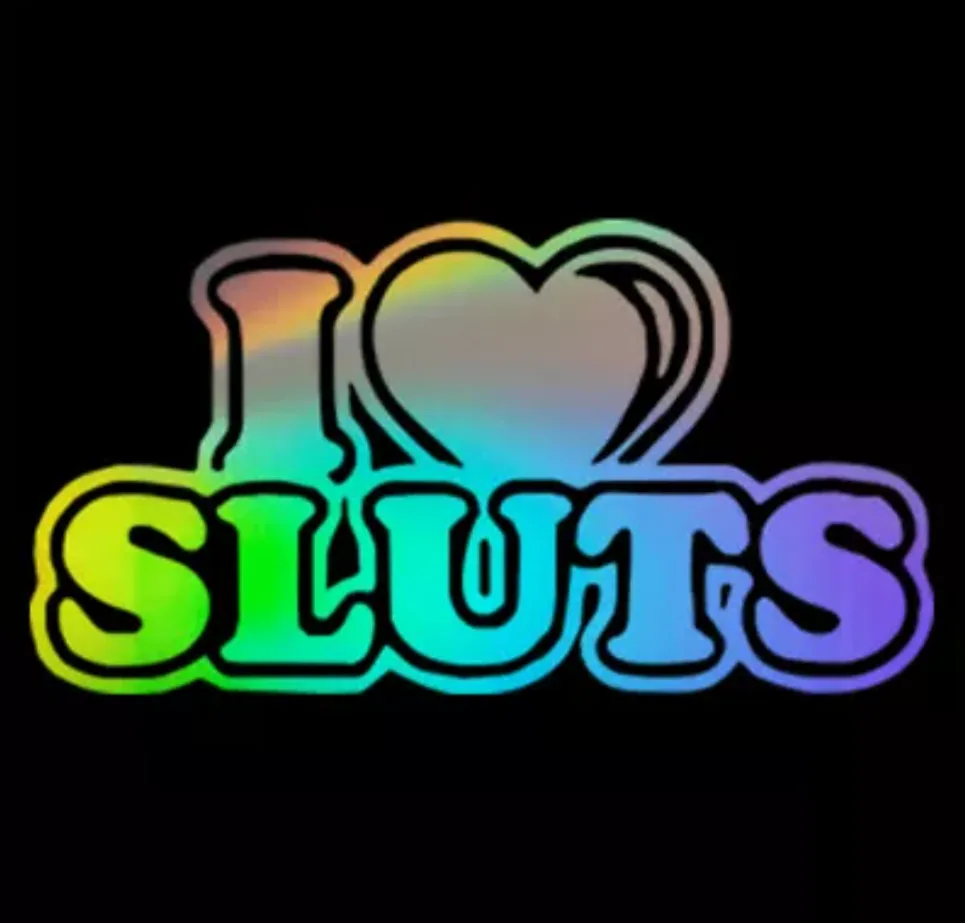A black background features the phrase 'I ❤️ SLUTS' in bold, stylized lettering with a rainbow gradient effect. The 'I' and…