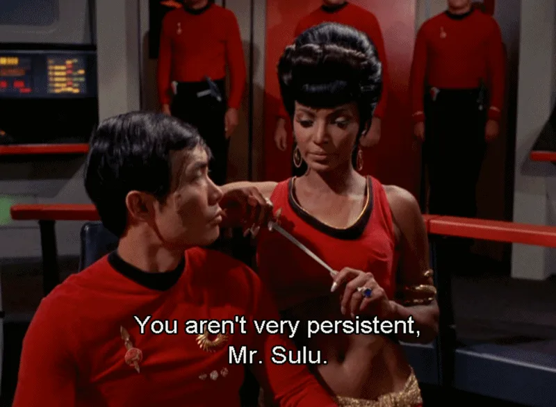 A six-panel comic strip from the original Star Trek series showing Uhura and Sulu in a romantic scene. In the first three…